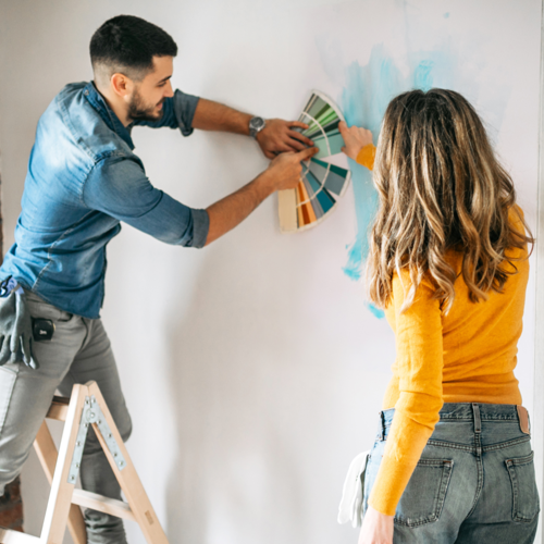 Couple Painting Their Wall