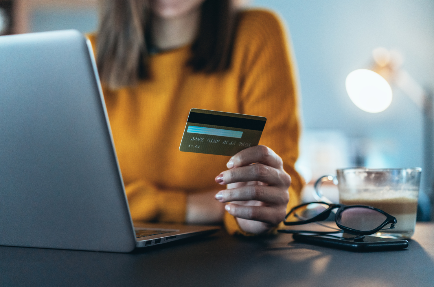 Woman Holding A Bank Card